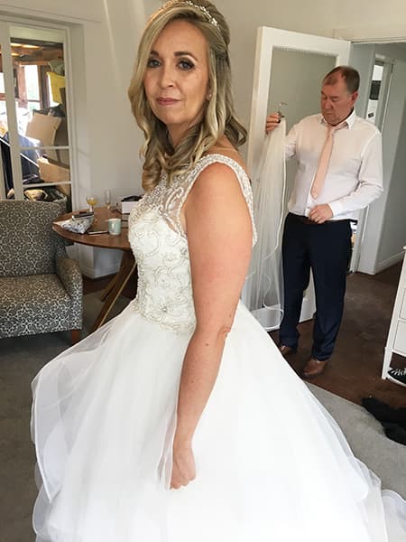 Smiling bride with soft natural glam