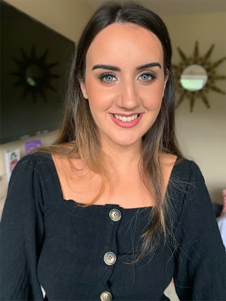 Soft glowing makeup on Carmel for evening event