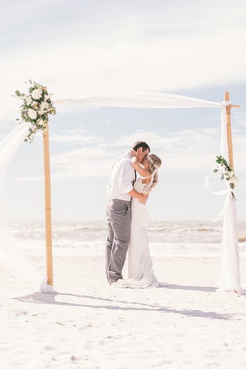 Couple getting married at the beach